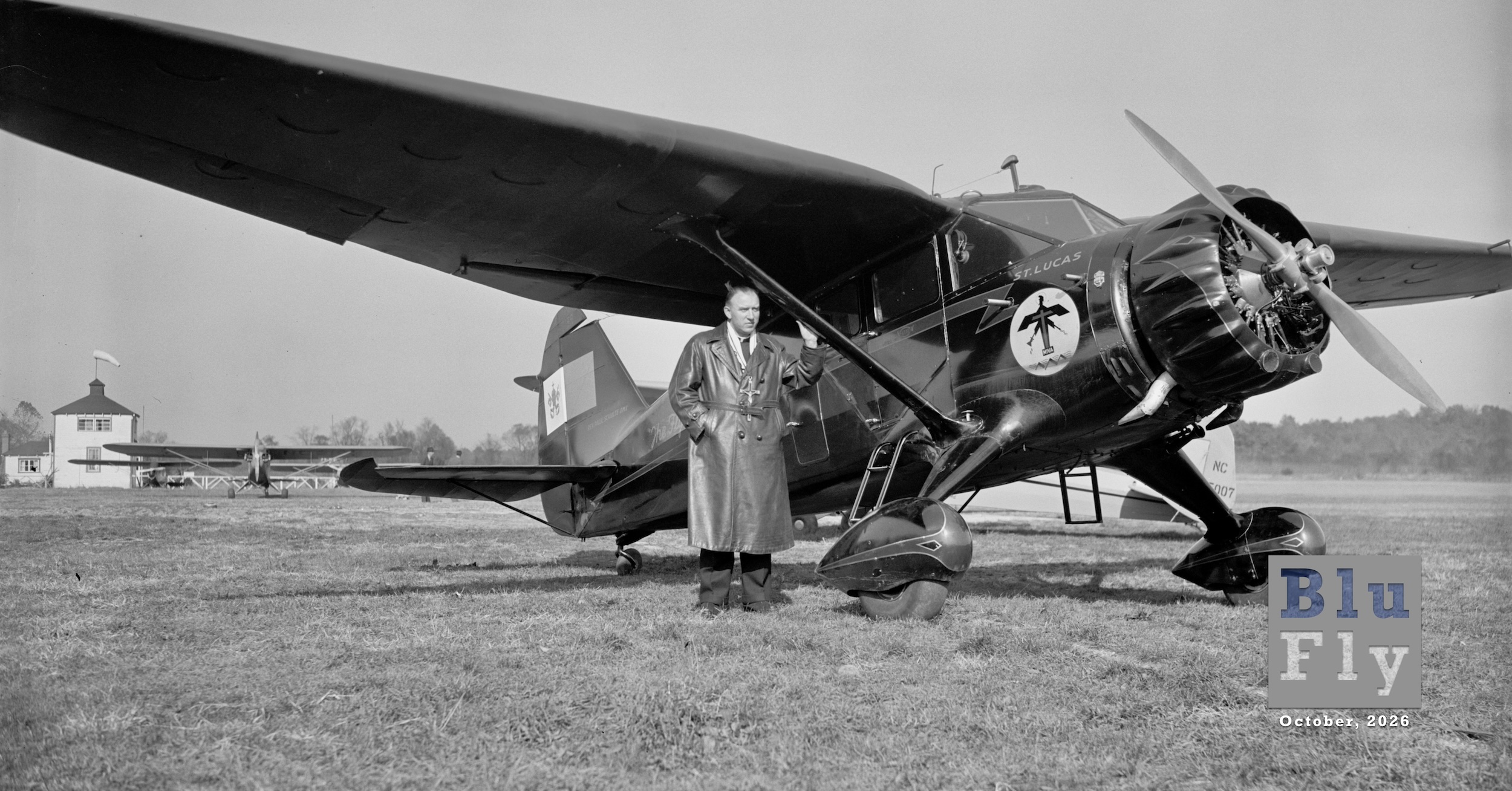 A vintage photo of a man in a long leather coat standing beside a Stinson SR-8BM Reliant aircraft, which is parked on a grass runway. (📸 From the Harris & Ewing Collection located at the Library of Congress, in the public domain.)