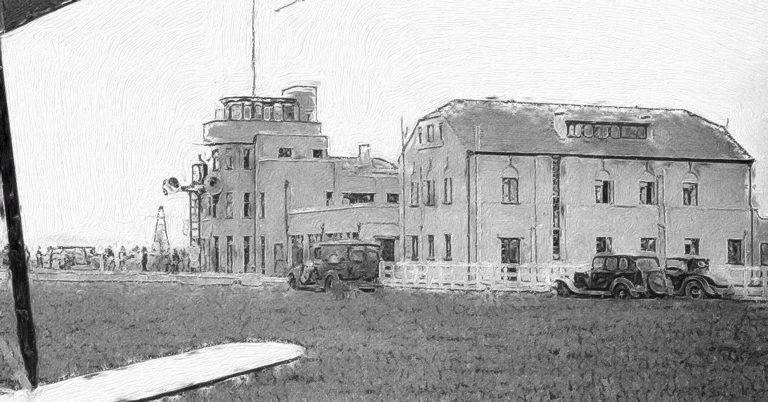 A black and white image of Heston Aerodrome in the 1930s. It shows what appears to be an early version of a control tower, as well as another, two-storey building with three sedan-type cars parked outside. The 'ramp', such as it is, appears to be long grass. On the left side of the frame are the tips of two wings of a biplane, along with the strut connecting the two. Original caption: « ATC had been introduced by Airwork in 1933 with a self-briefing meteorological service and R/T services. In 1935, a Lorenz blind approach was installed. Before the Lorenz system was installed, the Air Ministry took over ATC. In 1938, the Lorenz system was augmented with the installation of a VHF radio beacon and coloured approach lighting. » (📸 Barry Davidson Collection via atchistory website. The image has been cropped and then processed with the Brushstroke app to simulate a hand-drawn appearance with either pencil or charcoal.)